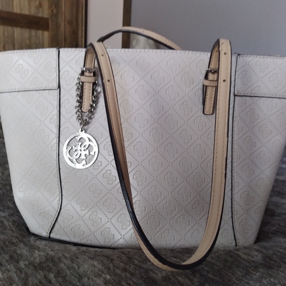 Guess purse, very light tan, 16"w x 10"L x 5" deep.  Absolutely great condition.
